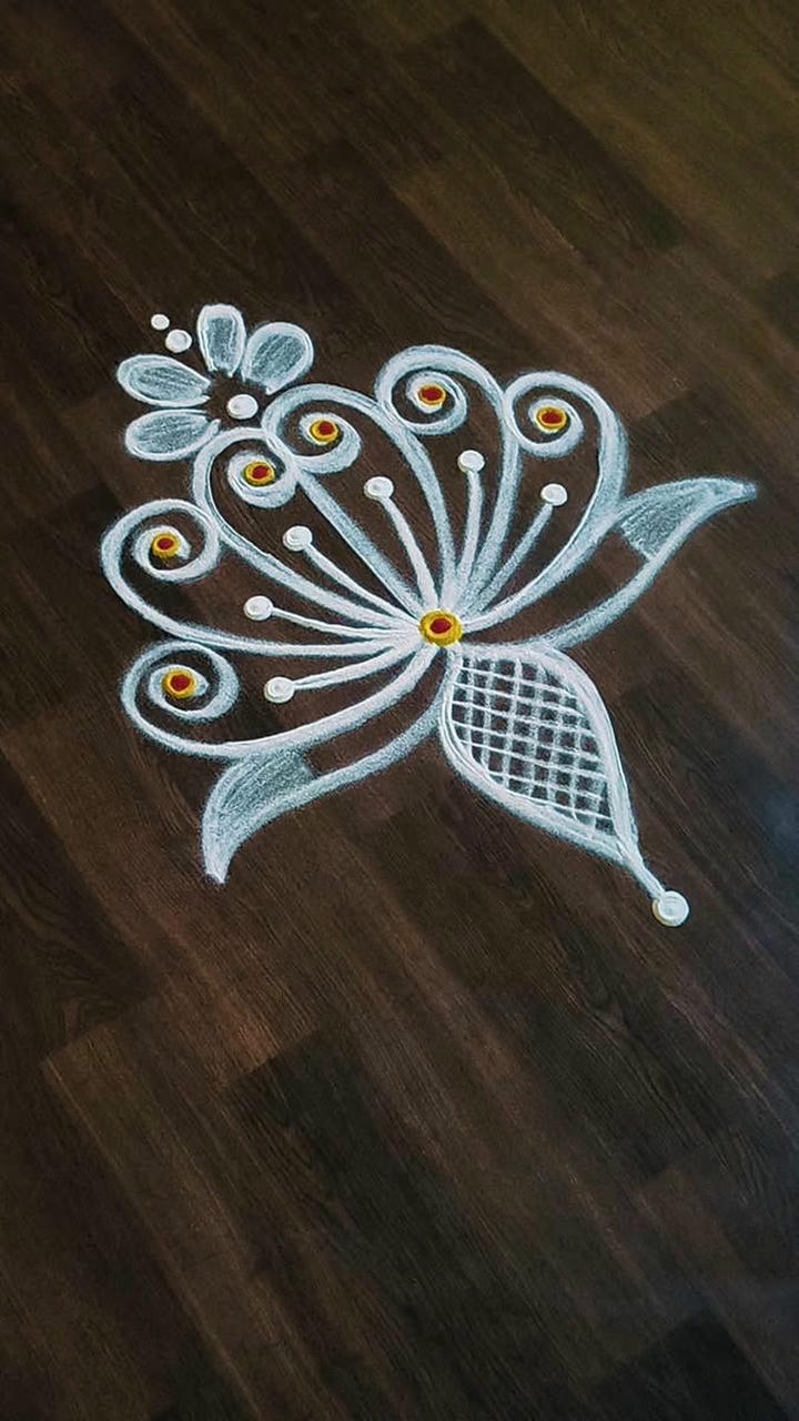 rangoli design photo with flowers